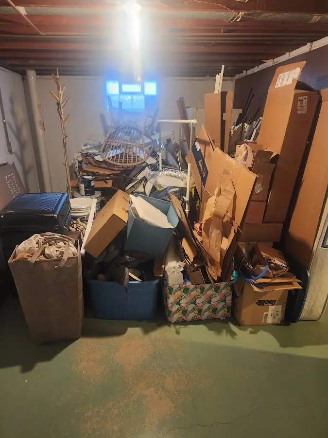 Roll-off dumpster container at job site for 2 Yard Dumpster Rental in Mound